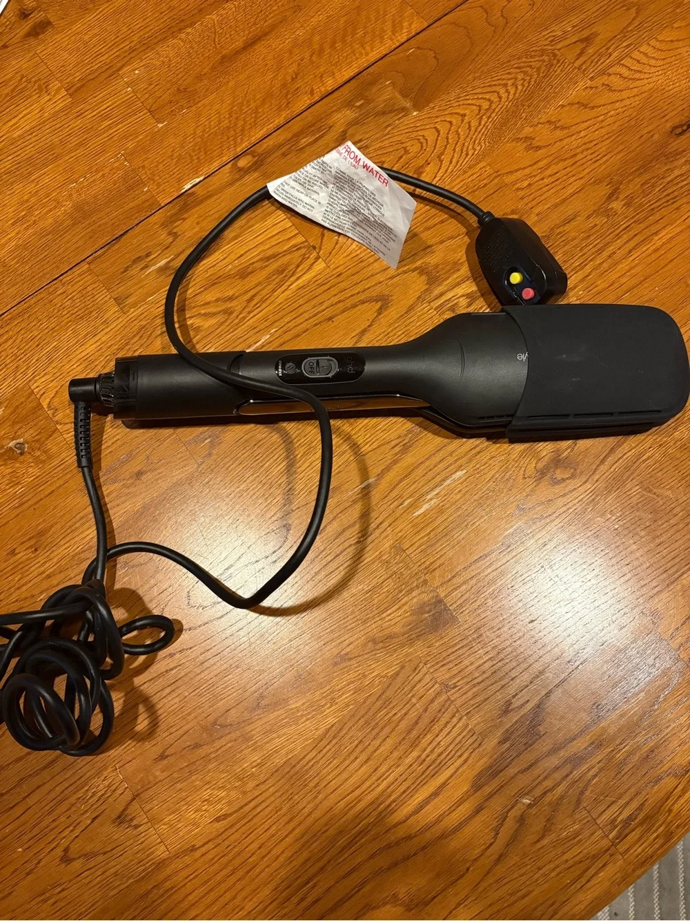 ghd black paddle straightener with blue LED